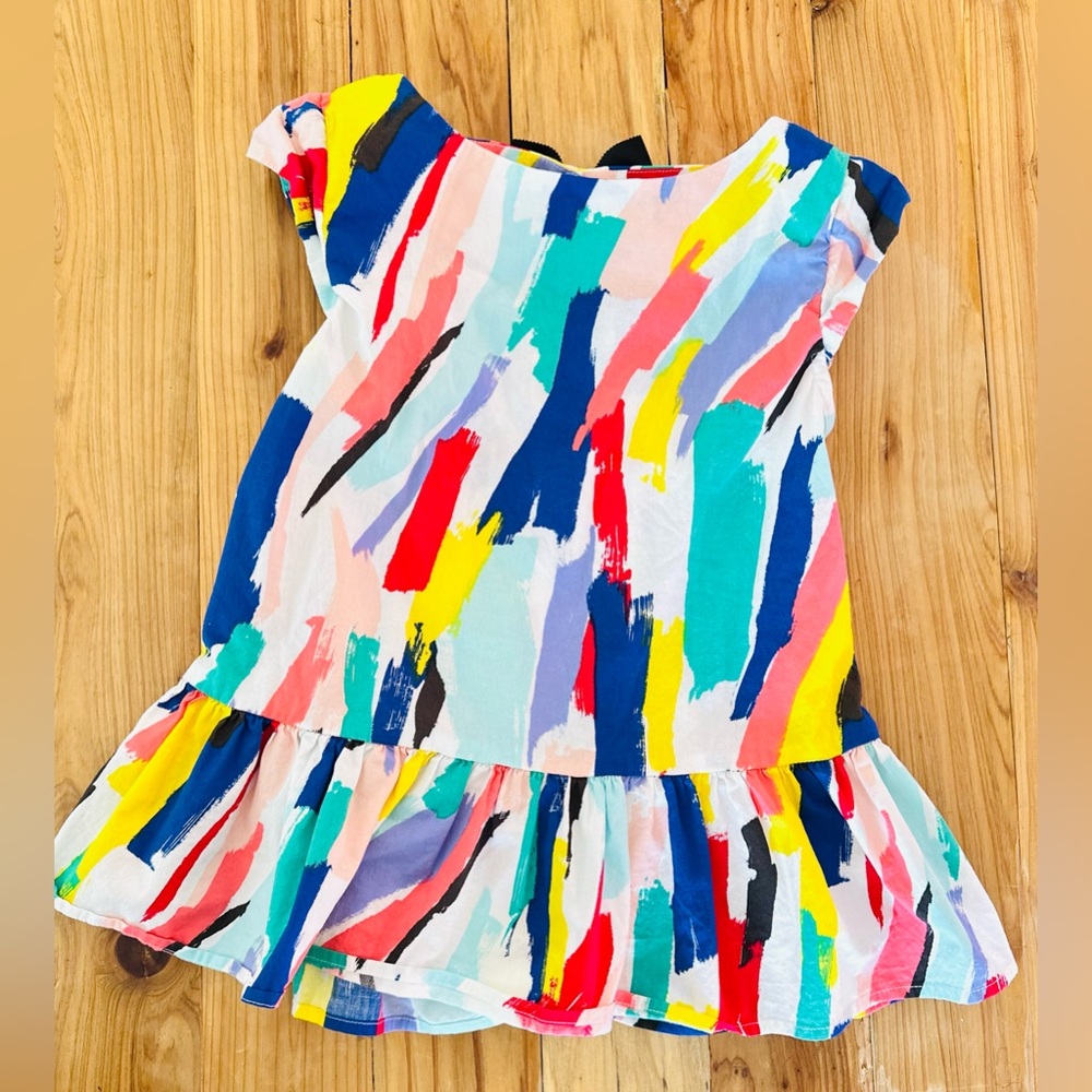Kate Spade girls peplum abstract top with bowed keyhole back button